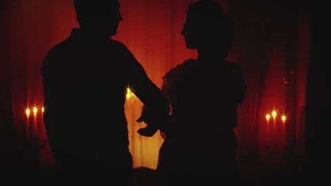 Black silhouette two gothic person, happy couple together man king walking with Stock Footage 329291090