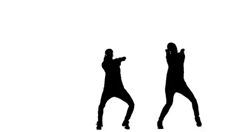 Black silhouette on a white background, duet girls dance hip-hop street dancing Vídeo Stock 121404498