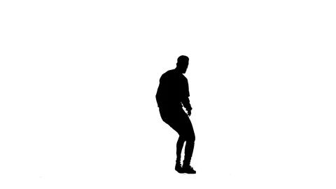 Black silhouette on a white background, guy dancing break dance, isolated Stock Footage 121514916