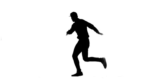 Black silhouette on a white background, man dancing breakdance, isolated Stock Footage 121514818