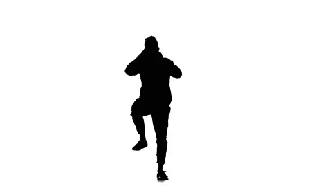 Black silhouette on a white background, young guy dancing hip hop, freestyle Stock Footage 130353489