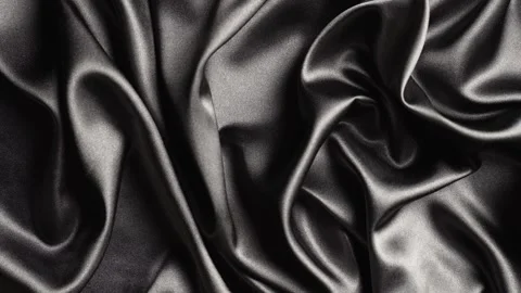 Black silk fabric draped in soft folds, close-up Stock Footage 295019671