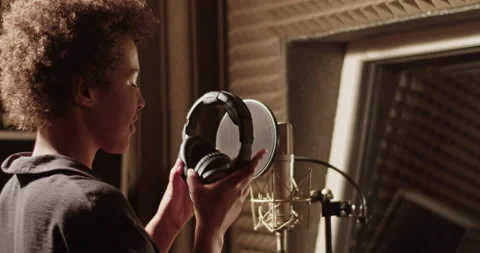 Black singer preparing to record song Stock Footage 201853506