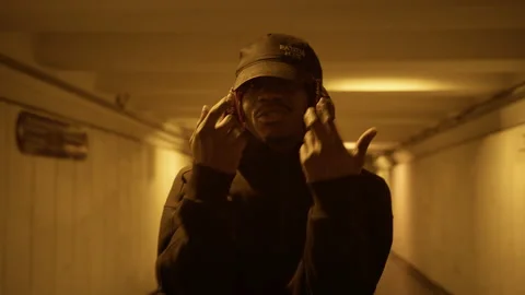 Black singer reads rapping while looking at camera, gesticulating with his hands Stock Footage 170642380