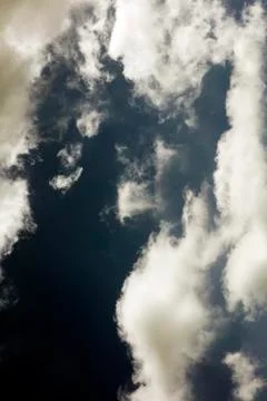 Black sky with white clouds dark mood space art fifty megapixels Stock Photos