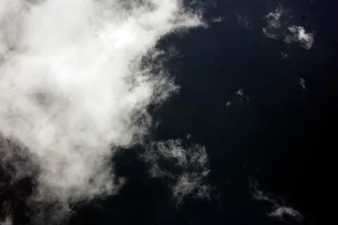 Black sky with white clouds dark mood space art fifty megapixels Stock Photos