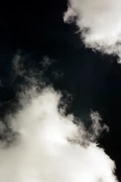 Black sky with white clouds dark mood space art fifty megapixels Stock Photos