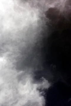 Black sky with white clouds dark mood space art fifty megapixels Stock Photos