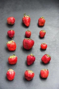 On black slate background Strawberries series put Foto stock