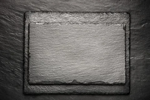 Black slate board for serving with copy space, top view Stock Photos