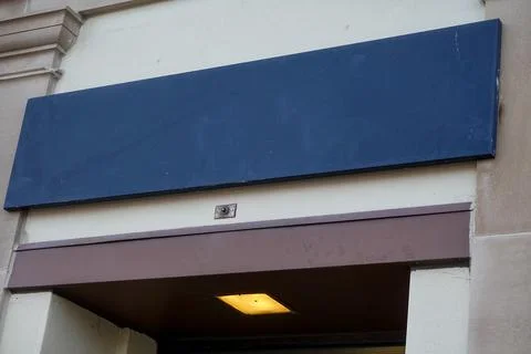 Black slate rectangular blank sign over a stone doorway  Stock Photos