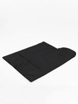 Black sleeping bag folded triangle close up Stock Photos