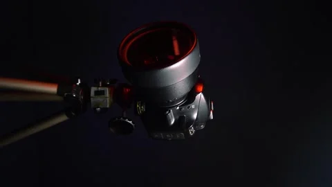 Black SLR camera on a tripod Video stock 302340363