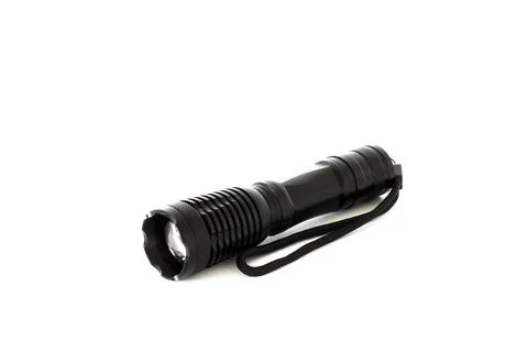 Black small flashlight on a white background. Lantern Stock Photos