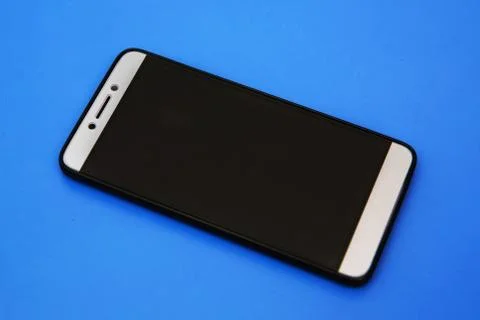 Black smartphone with black screen. Android mobile phone . Empty screen . Black Stock Photos