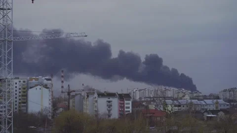 Black smoke after a rocket attack on Ivano-Frankivsk airport in Ukraine. The Stock Footage 171186424