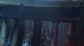 Black smoke rising above burnt building pillars, burning house HD Footage