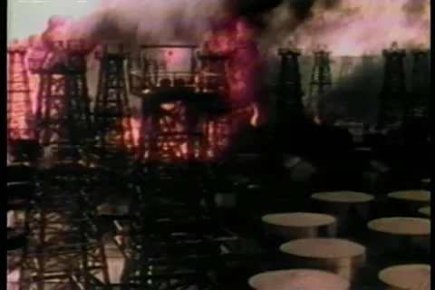 Black smoke spreading through burning oil refinery Stock Footage 11349257