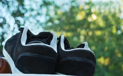 Black sneakers Stock Photos