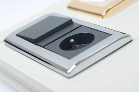 Black socket and light switch combination Stock Photos