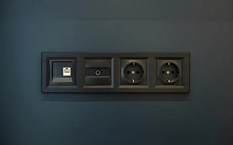 Black sockets on the wall Stock Photos