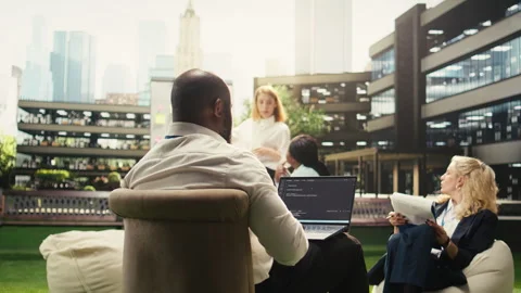 Black software developer working on programming code on laptop Stock Footage 338388152