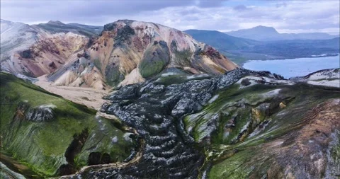 Black Solid Lava Basalt On Surface Of Mountain Slope In Iceland Landscape Stock Footage 252064410