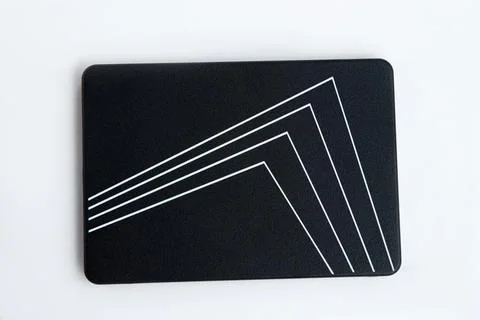 Black solid state drive with white lines Stock Photos