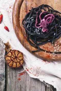 Black spaghetti with octopus Stock Photos