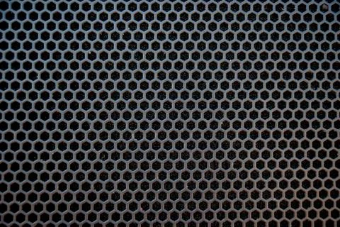 Black speaker grid texture. Stock Photos