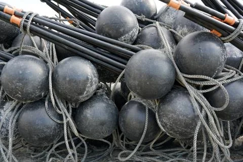 Black spherical plastic floats Stock Photos