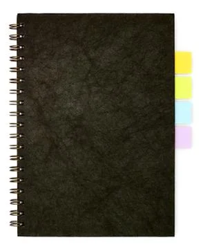Black spiral note book and post it Stock Photos