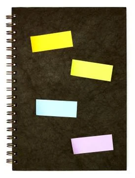 Black spiral note book and post it Stock Photos