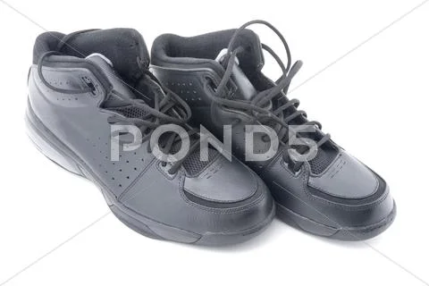 Black sport shoes on white Stock Photos