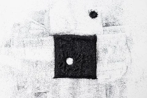 The black square from glitter with circular hole and the black circle from .. 스톡 사진