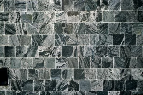 Black square tile background &amp; wallpaper Stock Photos