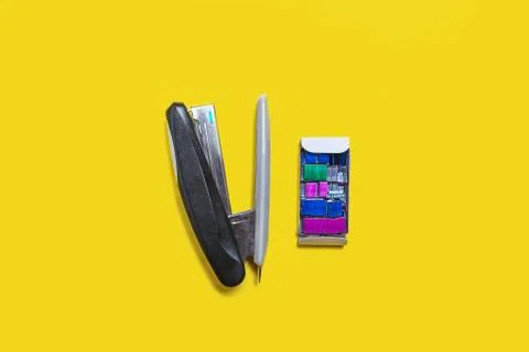Black stapler with box of braces Stock Photos