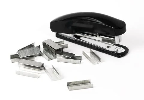 Black stapler with staples Stock Photos