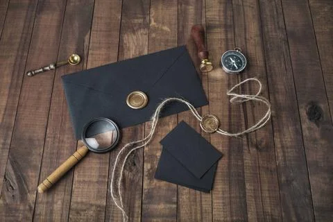 Black stationery elements Set of black stationery elements on vintage wood... Stock Photos