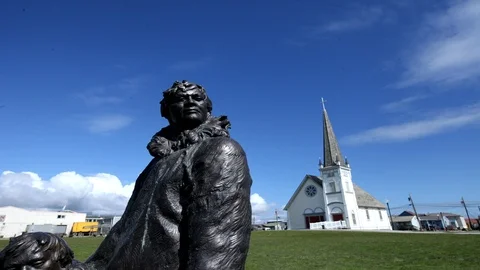 Black statue of a man in Barrow, Alaska - Time Lapse Stock Footage 104961933