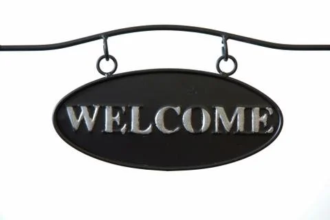 Black steel plate with word welcome Stock-Fotos