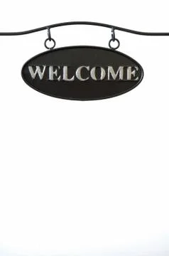 Black steel plate with word welcome Stock Photos