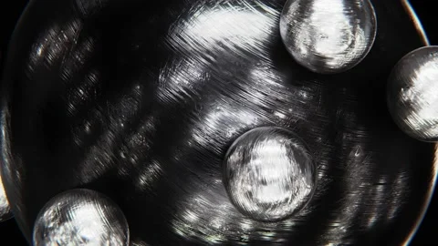 Black steel sphere with rolling small silver metal spheres looping 3D animation Stock Footage 194135053