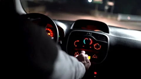 Black steering wheel inside car, drive in night city street. hands on steering Stock-Footage 336265419