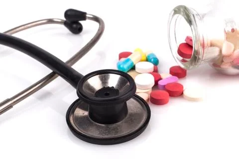 Black Stethoscope and Pills Stock Photos