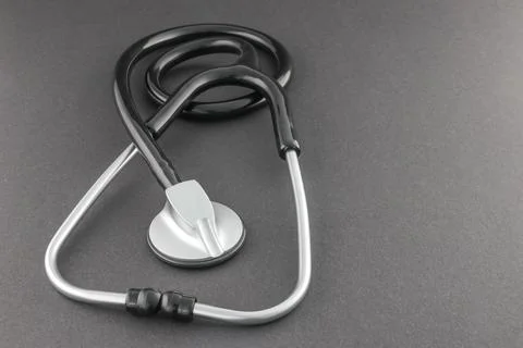 Black Stethoscope on Black Background Stock Photos