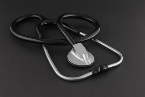 Black Stethoscope on Black Background Stock Photos