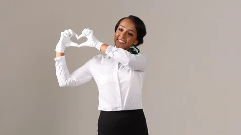 Black stewardess on gray background Stock Footage 98212705