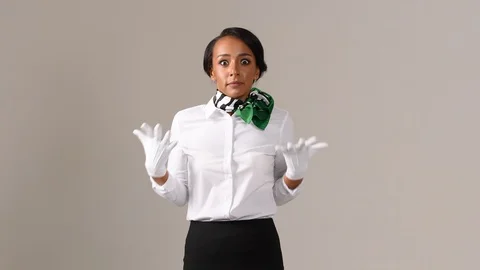 Black stewardess on gray background Stock-Footage 98213491