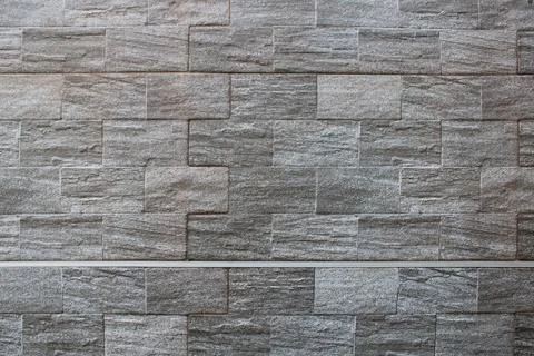 Black stone wall for background design. Stock Photos